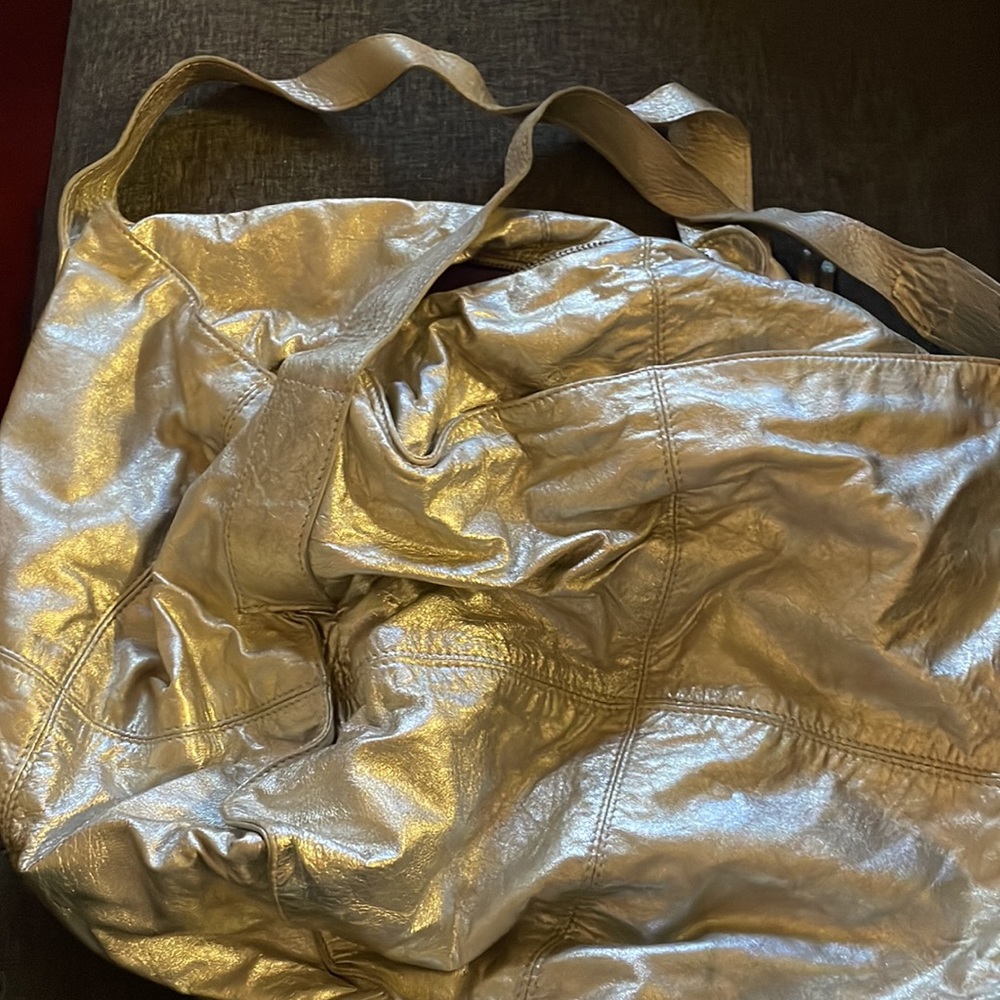 French zip top tote purchased in Paris metallic silver leather great condition